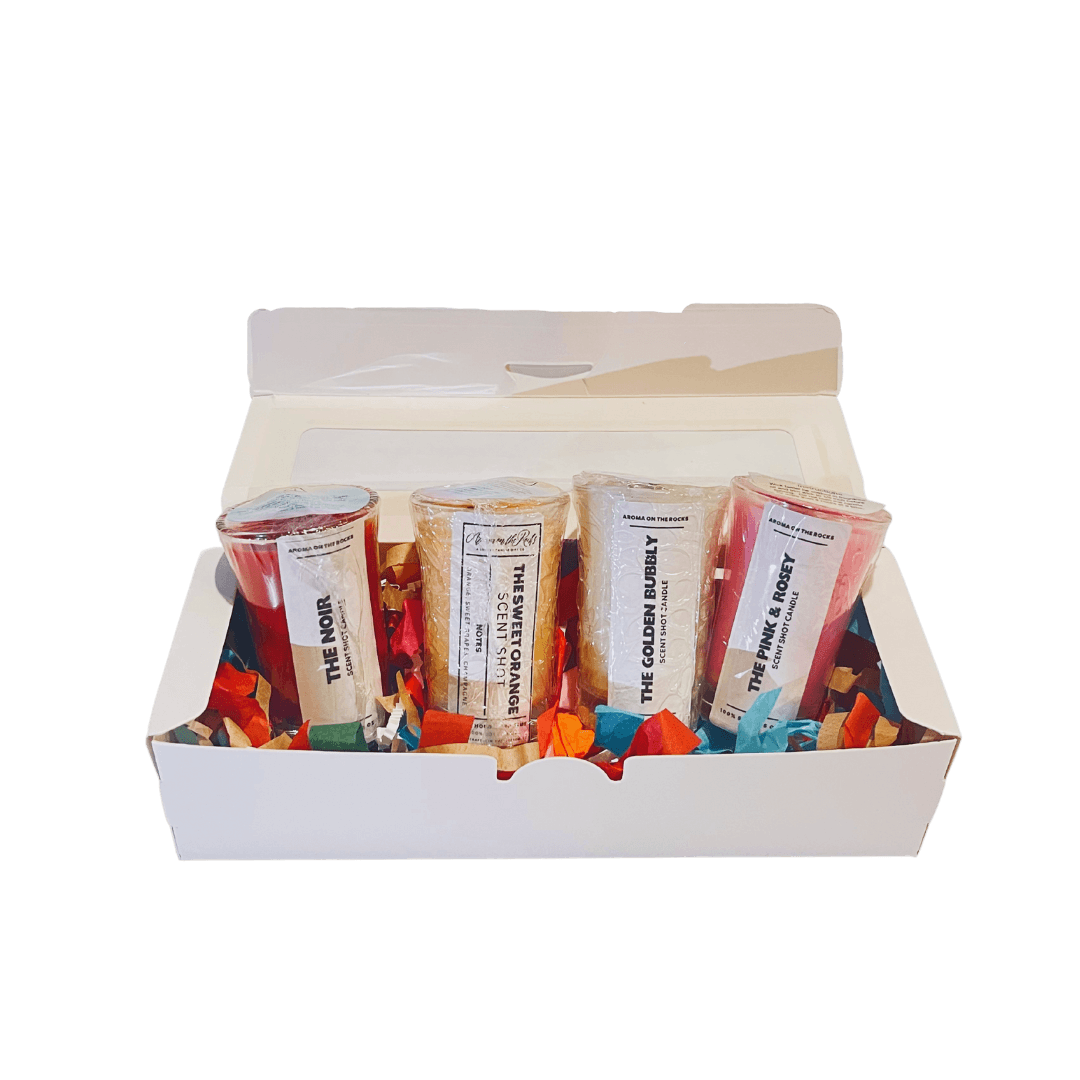 Discover 'The Sweet Florals Half Size Scent Flight Box' - An Enchanting Collection of Floral Fragrances. Set includes four captivating scent shots: 'The Pink & Rosey,' 'The Sweet Orange,' 'The Noir,' and 'The Golden Bubbly,' crafted with 100% soy wax and premium ingredients. Immerse yourself in romantic roses, tangy orange, luscious berries, and elegant champagne scents. Beautifully packaged for gifting or a luxurious treat. Elevate your senses with this delightful bouquet of aromas!