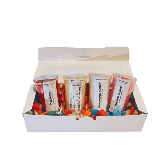 Discover 'The Sweet Florals Half Size Scent Flight Box' - An Enchanting Collection of Floral Fragrances. Set includes four captivating scent shots: 'The Pink & Rosey,' 'The Sweet Orange,' 'The Noir,' and 'The Golden Bubbly,' crafted with 100% soy wax and premium ingredients. Immerse yourself in romantic roses, tangy orange, luscious berries, and elegant champagne scents. Beautifully packaged for gifting or a luxurious treat. Elevate your senses with this delightful bouquet of aromas!