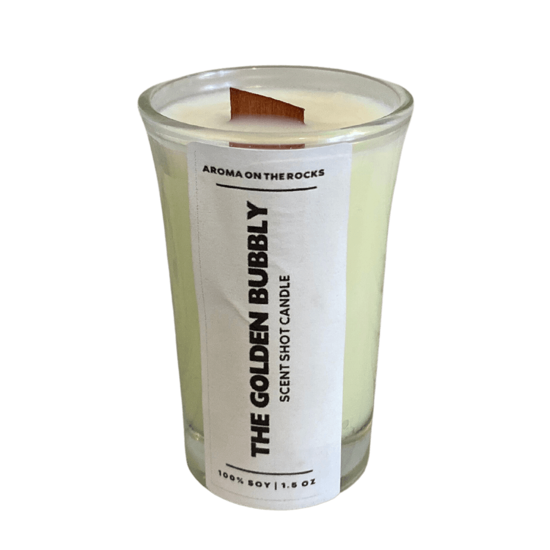 Discover 'The Golden Bubbly Scent Shot' Candle - An Elegant Ivory Delight with a Champagne Twist. Crafted from 100% Soy Wax with a Cherrywood Wick for a Clean, Long-Lasting Burn. Perfect for Relaxing Evenings or Special Occasions. Illuminate Your Space and Experience the Enchanting Aroma Today!