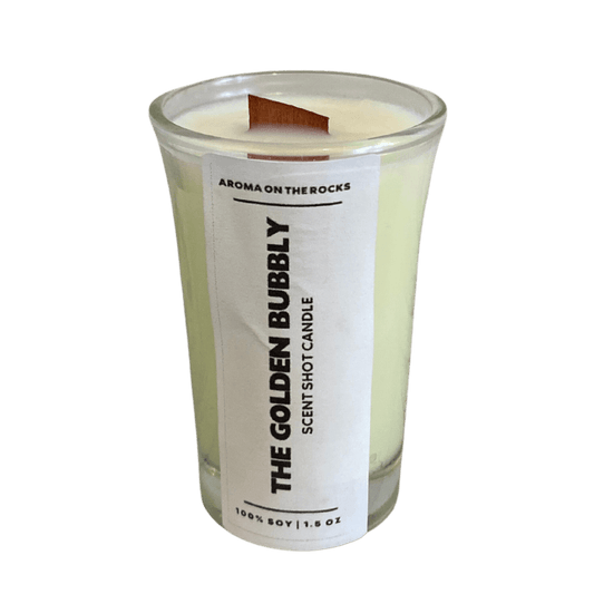 Discover 'The Golden Bubbly Scent Shot' Candle - An Elegant Ivory Delight with a Champagne Twist. Crafted from 100% Soy Wax with a Cherrywood Wick for a Clean, Long-Lasting Burn. Perfect for Relaxing Evenings or Special Occasions. Illuminate Your Space and Experience the Enchanting Aroma Today!
