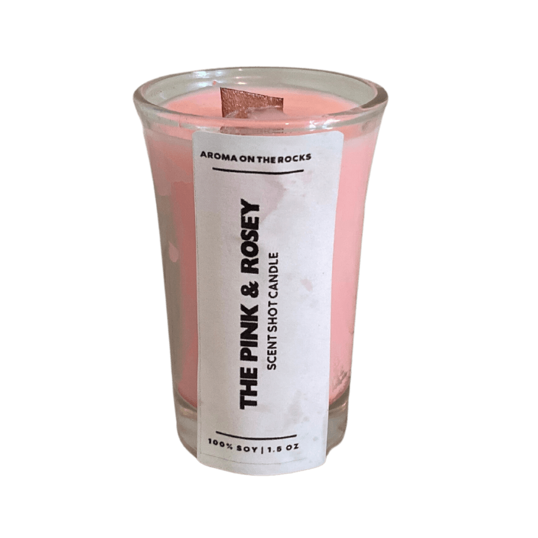 Introducing 'The Pink & Rosey Scent Shot' Candle - A Charming Pink Delight with a Captivating Rose and Floral Aroma, Inspired by Sweet Rosé Wine. Crafted from 100% Soy Wax with a Cherrywood Wick for a Clean, Long-Lasting Burn. Ideal for Creating a Romantic and Soothing Ambiance. Illuminate Your Space and Immerse Yourself in the Enchanting Fragrance Today!